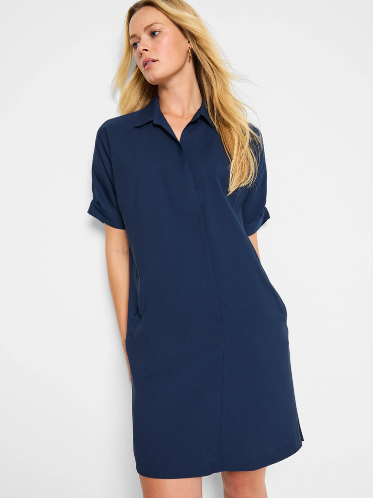 Dark blue shirt dress with a collar, V-neck, short cuffed sleeves, side pockets, and above-knee length.