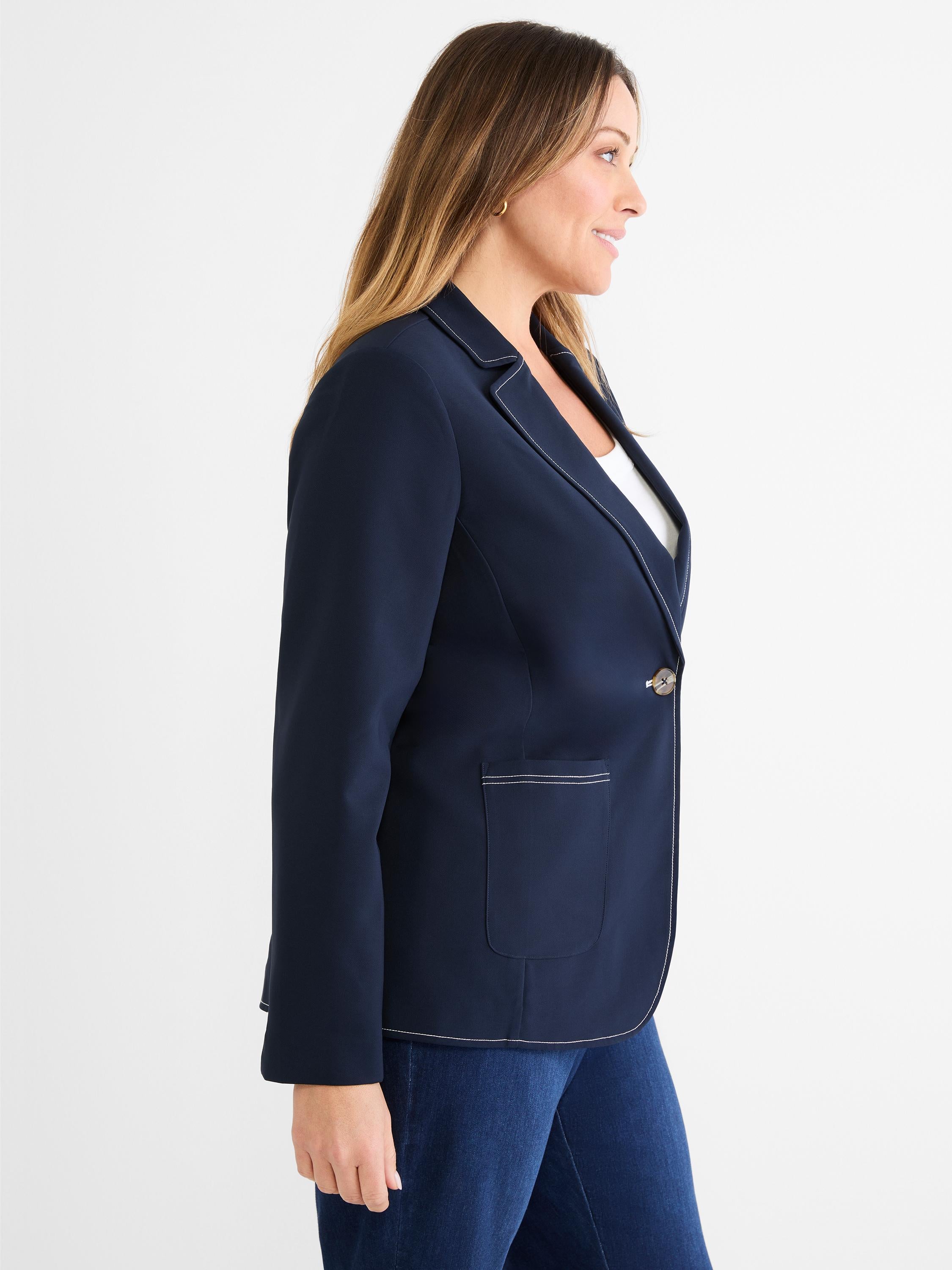 This tailored navy blazer features a single-button closure and bright white contrast stitching along the edges and pockets.