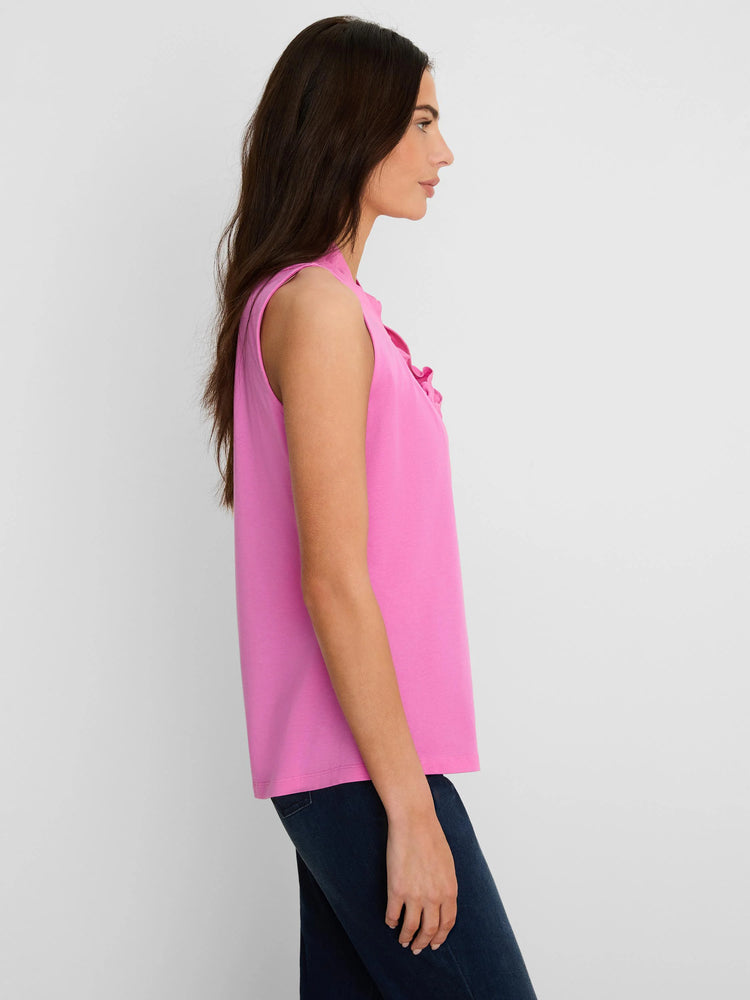 Pink sleeveless tank top with ruffles at the neckline.