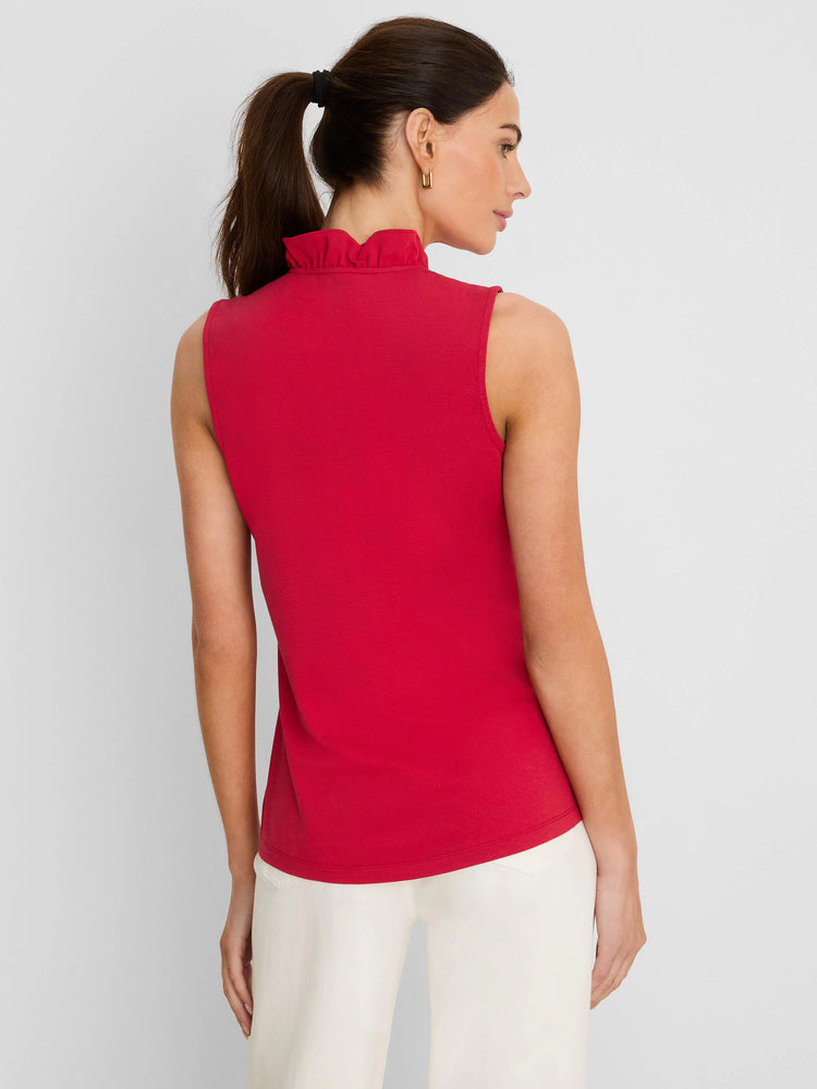 Red sleeveless tank with ruffled high neck. Model, back view.