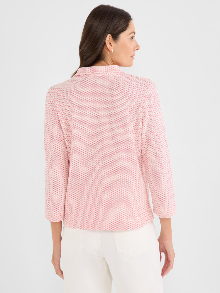 Pink and white collared knit jacket featuring a textured pattern and bracelet-length sleeves.