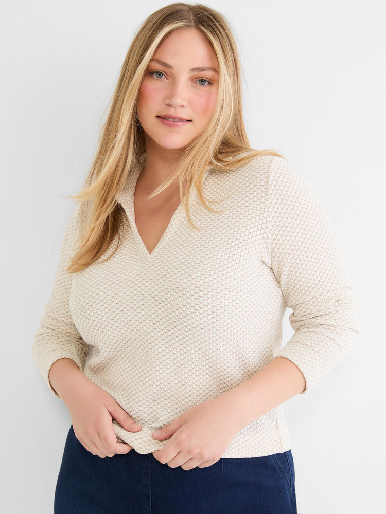 Cream waffle knit sweater features a standard fit and a modern open polo V-neck.