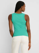 Mint green ribbed knit scoop tank. Model shown from back.