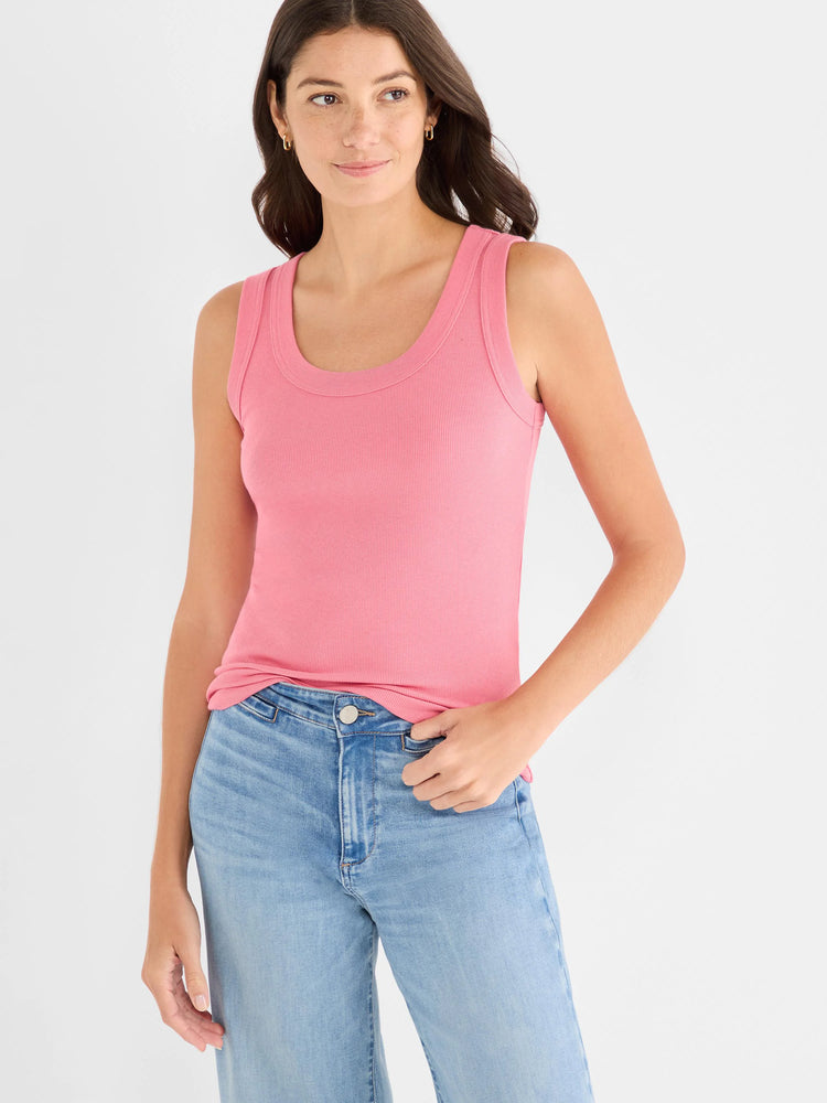Pink ribbed scoop neck tank top worn by a model.
