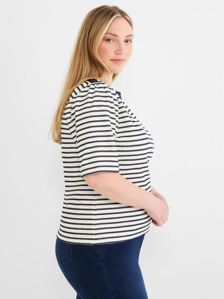 Cream and navy horizontally striped boatneck top with textured embroidery and short sleeves.