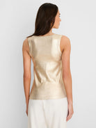 Shimmery gold ribbed tank top, sleeveless with a rounded back neckline.