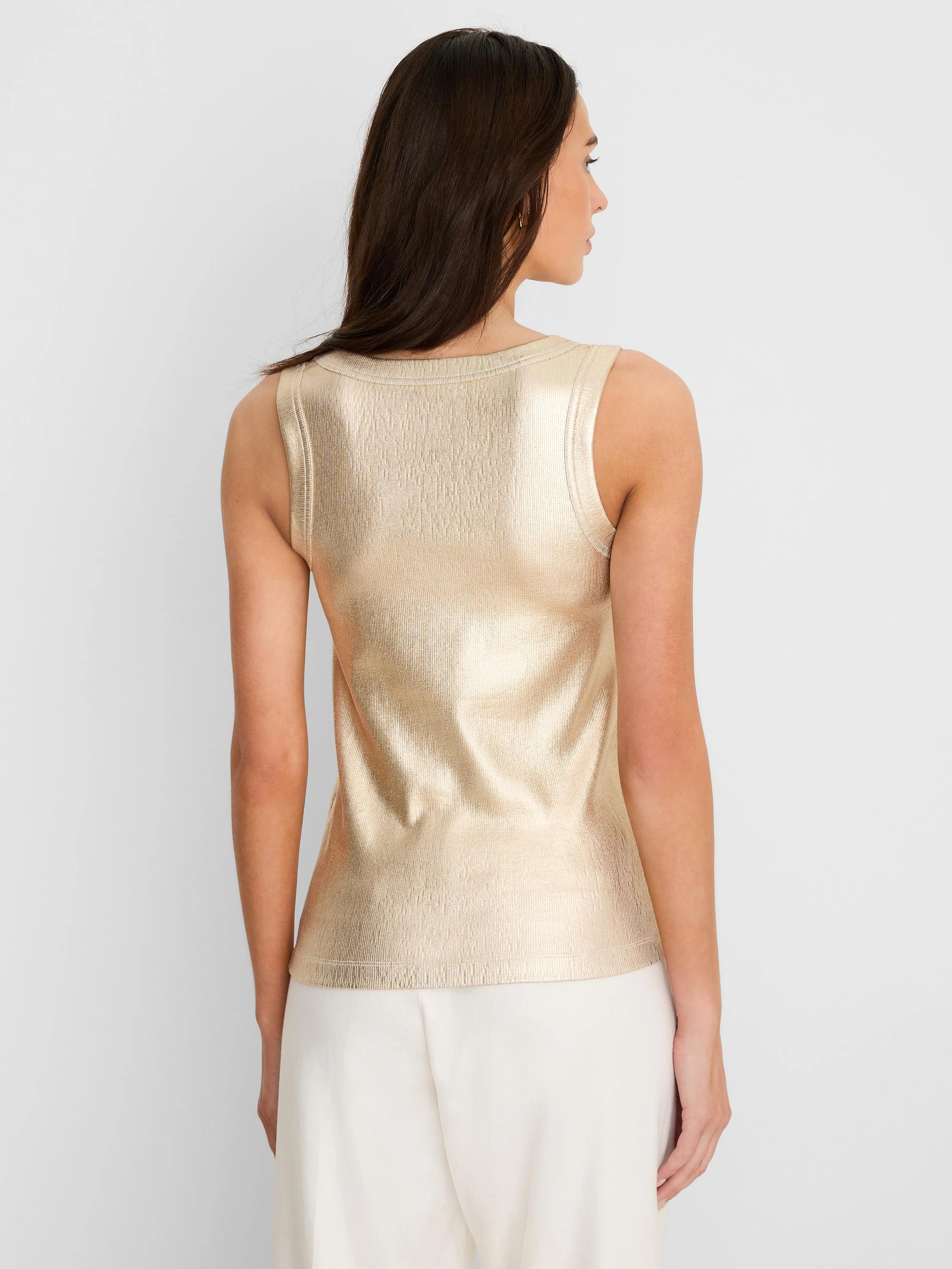 Shimmery gold ribbed tank top, sleeveless with a rounded back neckline.