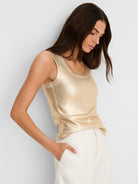 Shimmering gold ribbed tank with scoop neck.