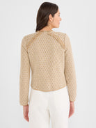 Fitted tan and white geometric knit jacket featuring long sleeves and frayed raglan trim details. [u:9rvm6o]