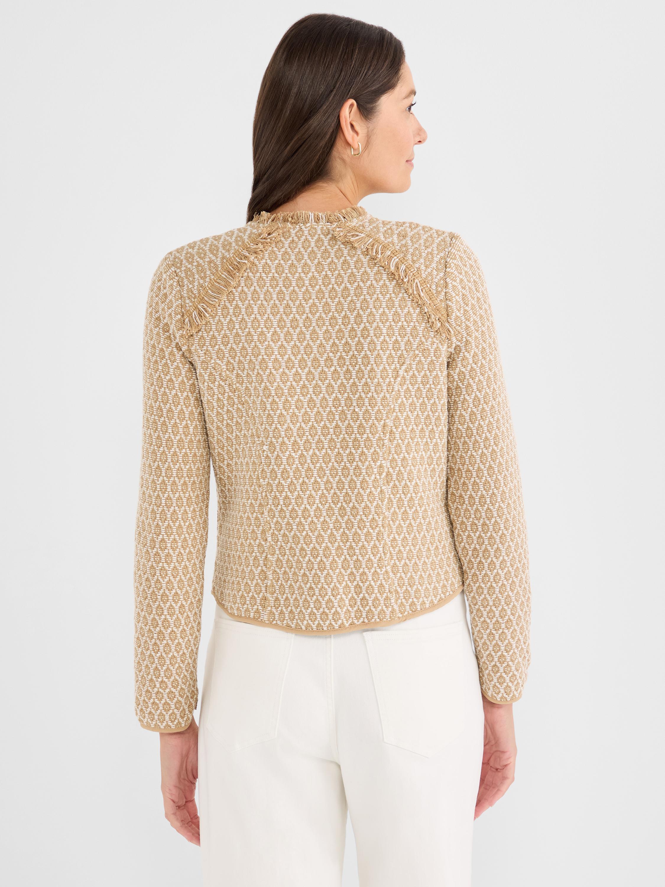 Fitted tan and white geometric knit jacket featuring long sleeves and frayed raglan trim details. [u:9rvm6o]