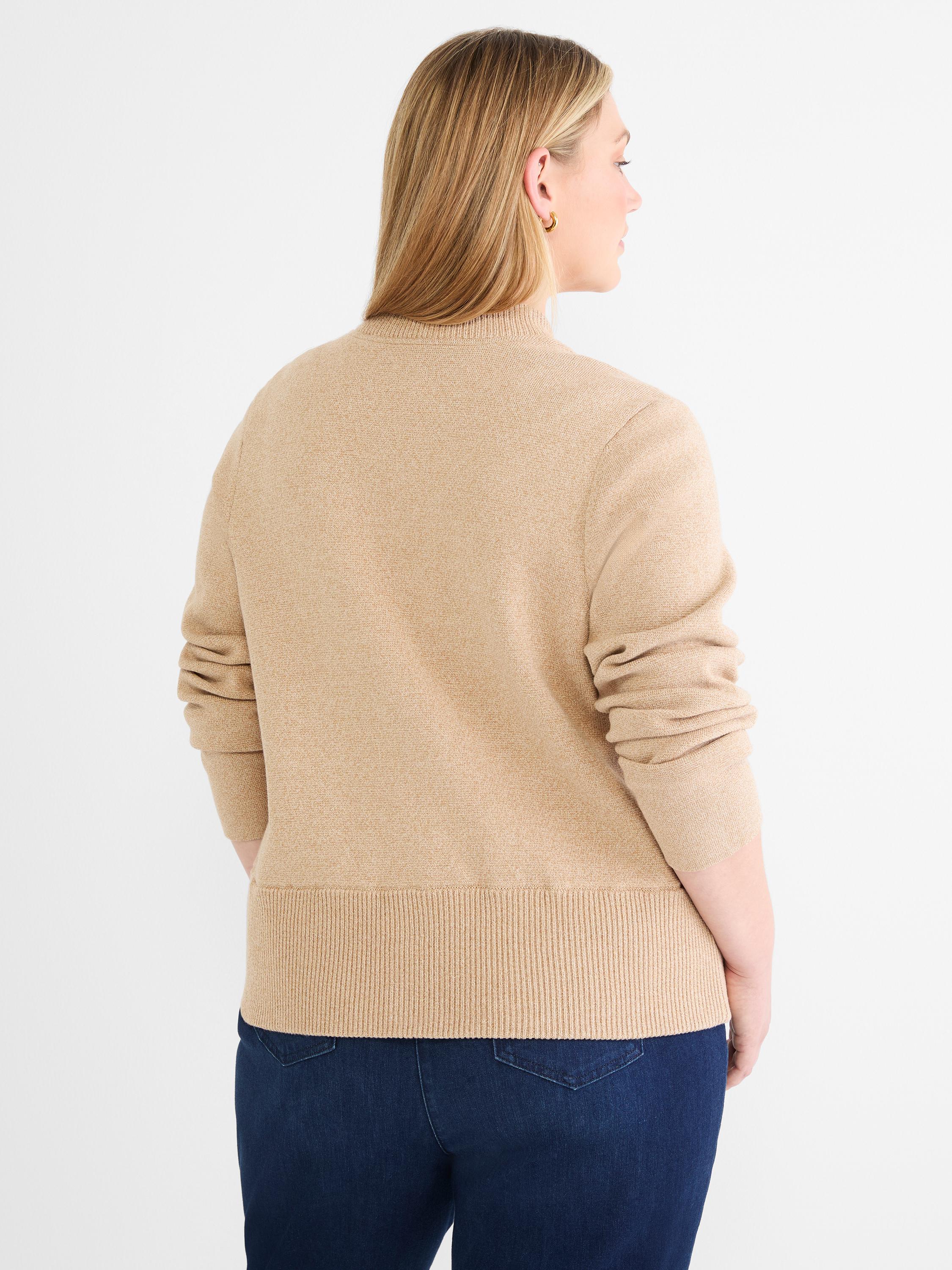 A tan heathered mock neck sweater with a ribbed hem is shown from the back on a model.