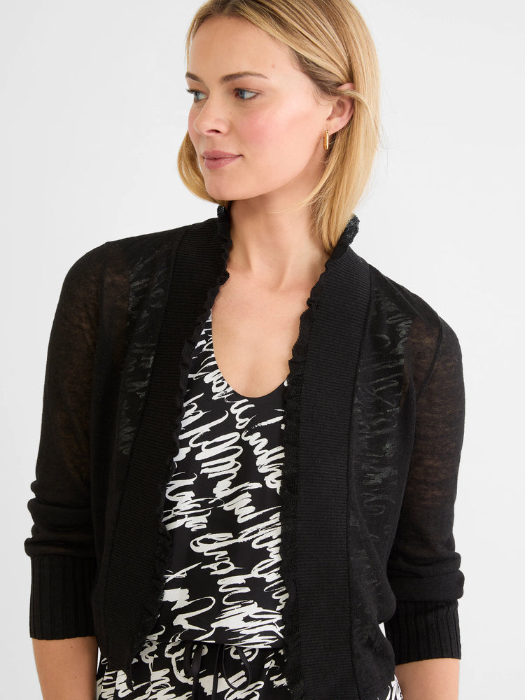 Black featherknit cardigan with sheer body and sleeves. Features an open front with ruffled edges and ribbed cuffs.
