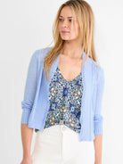 Light blue featherknit cardigan, open-front with ribbed cuffs.