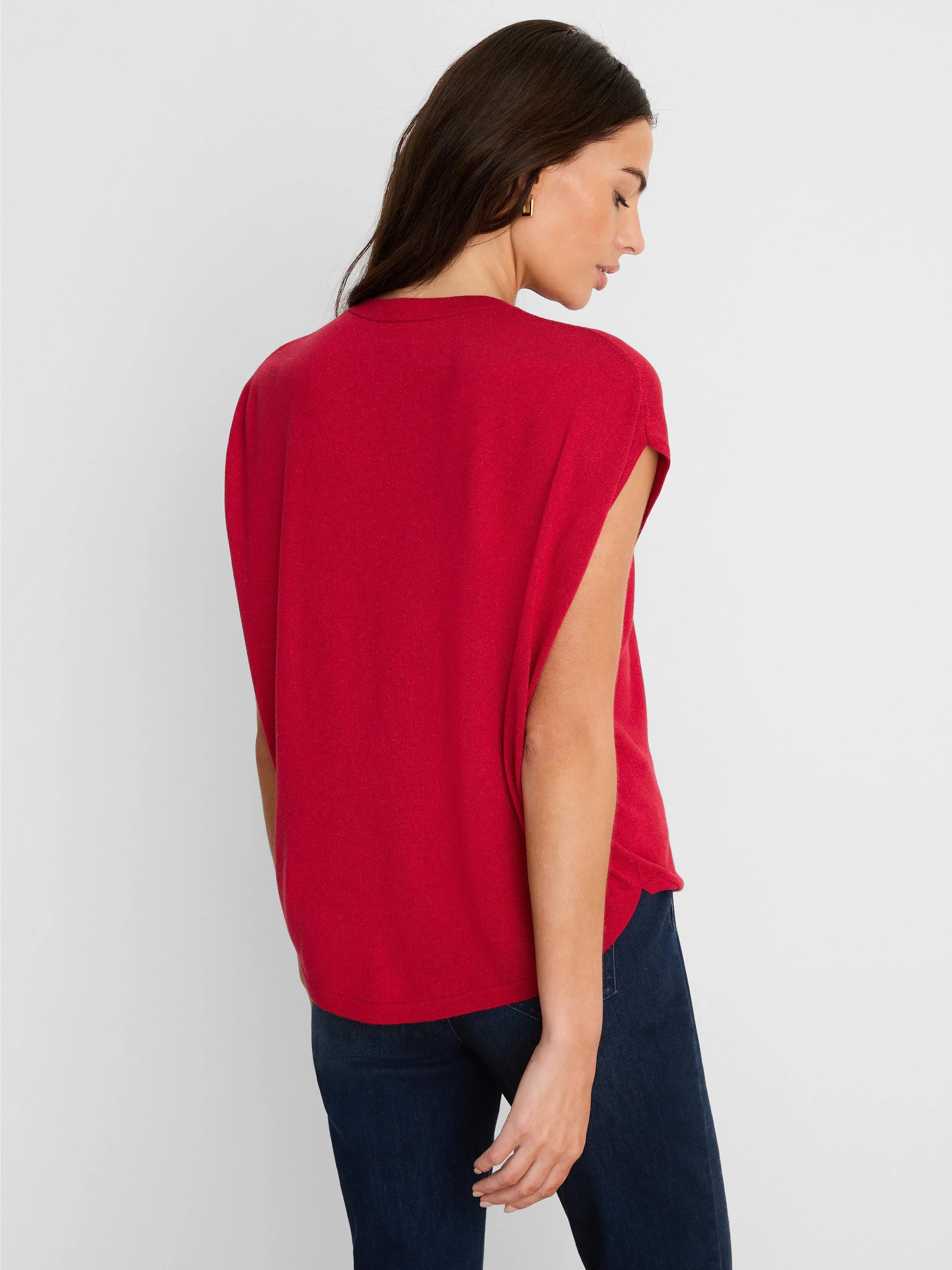 A red, fine-knit cocoon sweater with a loose fit and wide, open cap sleeves.