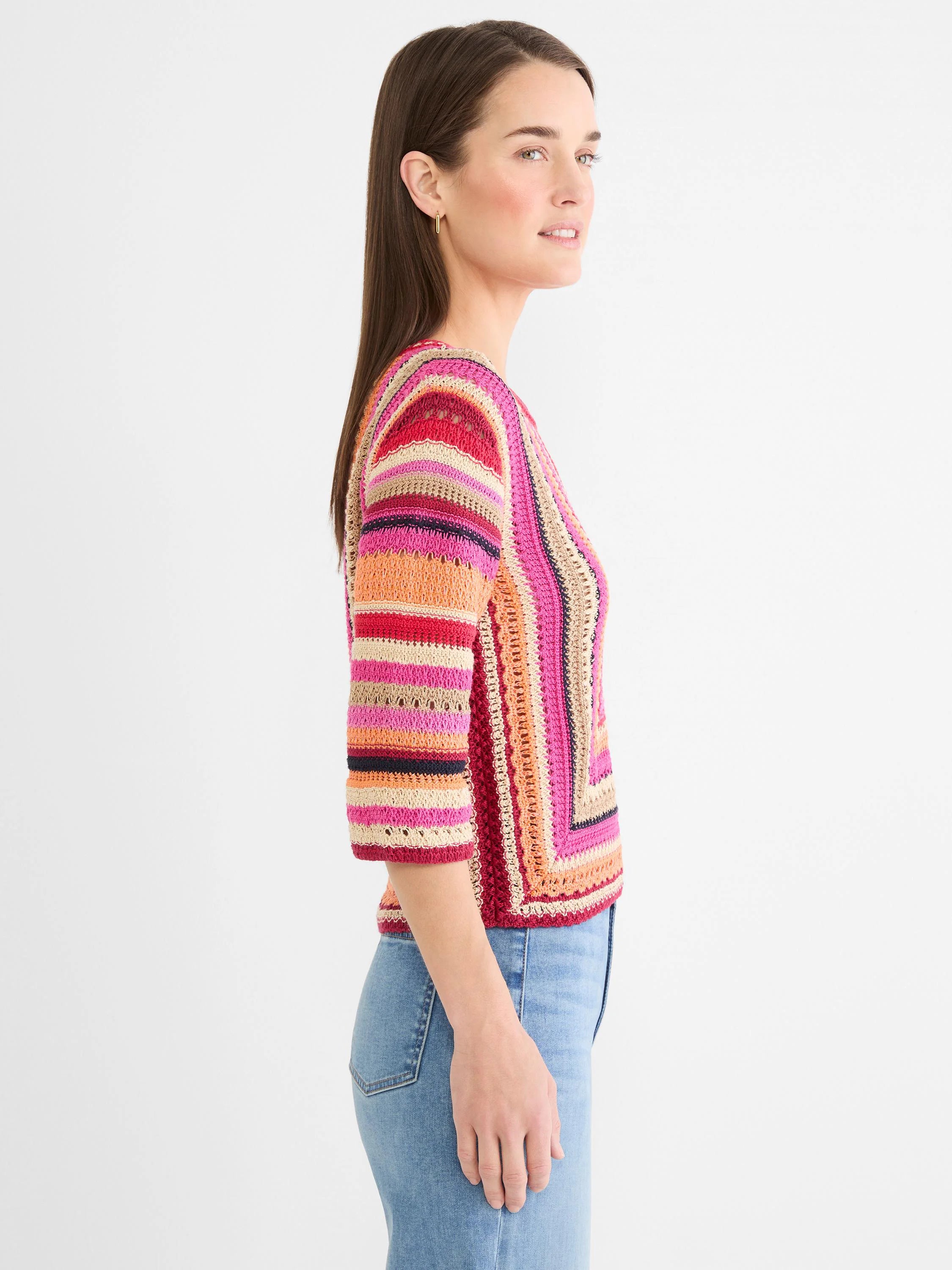 Crochet sweater with 3/4 sleeves, multi-directional stripes in pink, orange, red, tan, & navy.