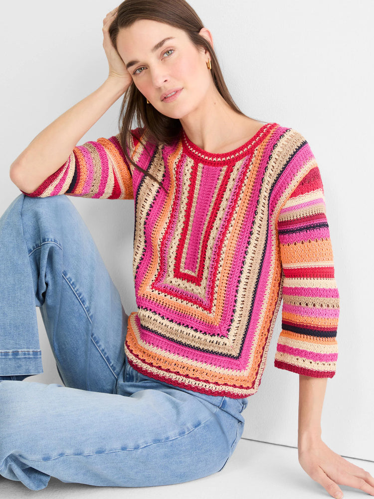 Multi-color striped crochet sweater with a central square pattern and 3/4 sleeves. Features pink, orange, red, and tan hues.