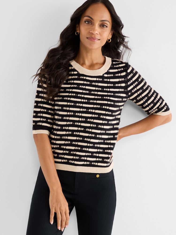 A fitted black and beige elbow-sleeve knit top with a crew neck and textured horizontal stripes.
