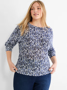 Indigo, blue, and white zigzag pattern sweater. Boat neck, 3/4 sleeves, relaxed fit.