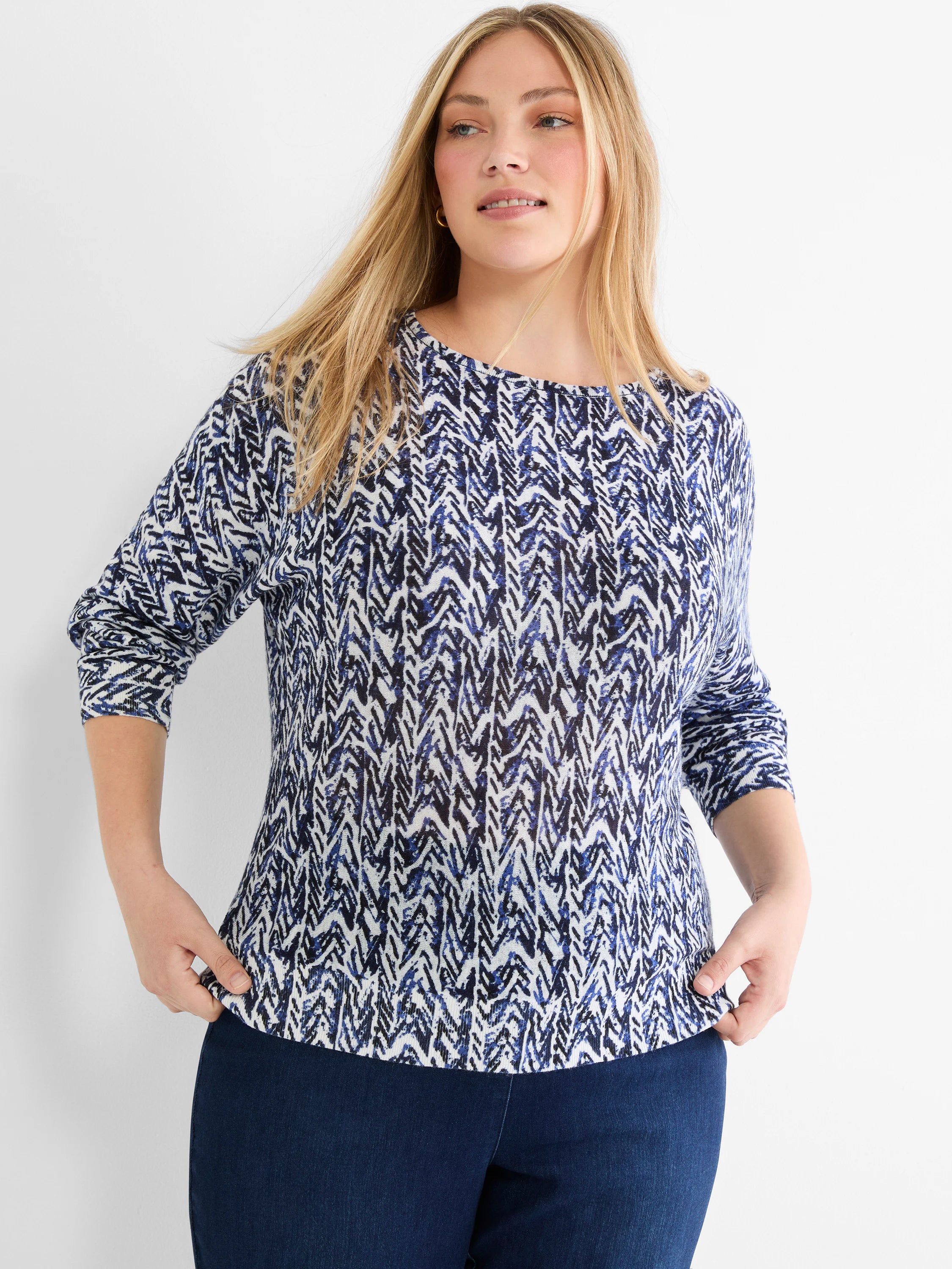 Indigo, blue, and white zigzag pattern sweater. Boat neck, 3/4 sleeves, relaxed fit.