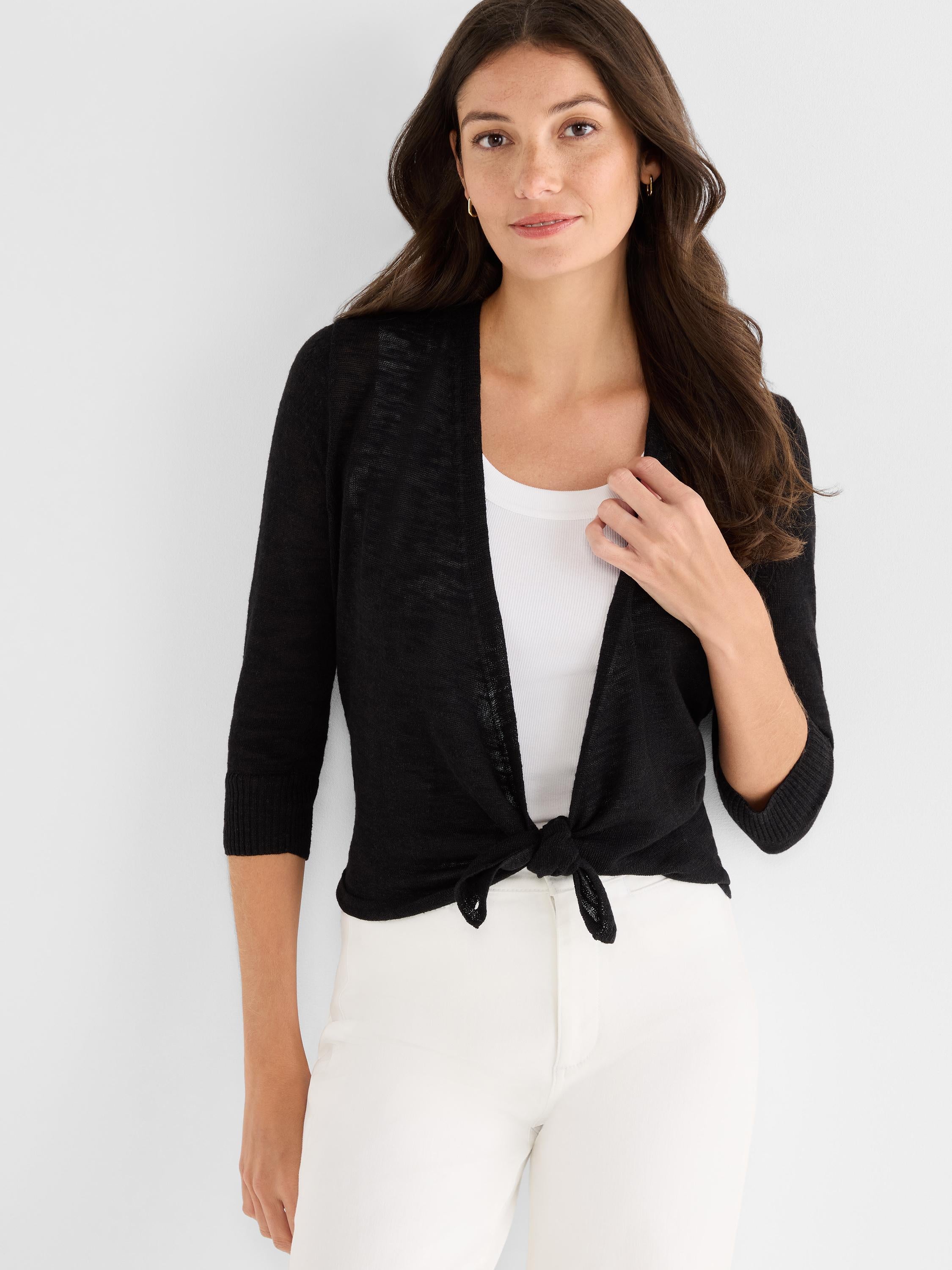 Lightweight black cardigan features a cropped fit, 3/4 sleeves, and is tied stylishly at the front waist.