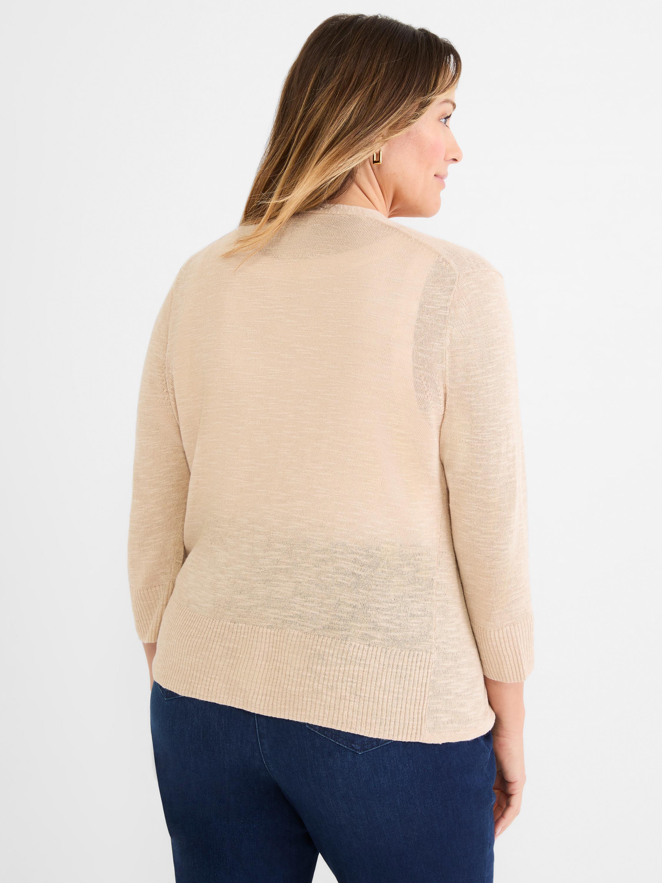 Beige fine-knit open cardigan featuring sheer texture, three-quarter sleeves, and a ribbed hip-length trim.