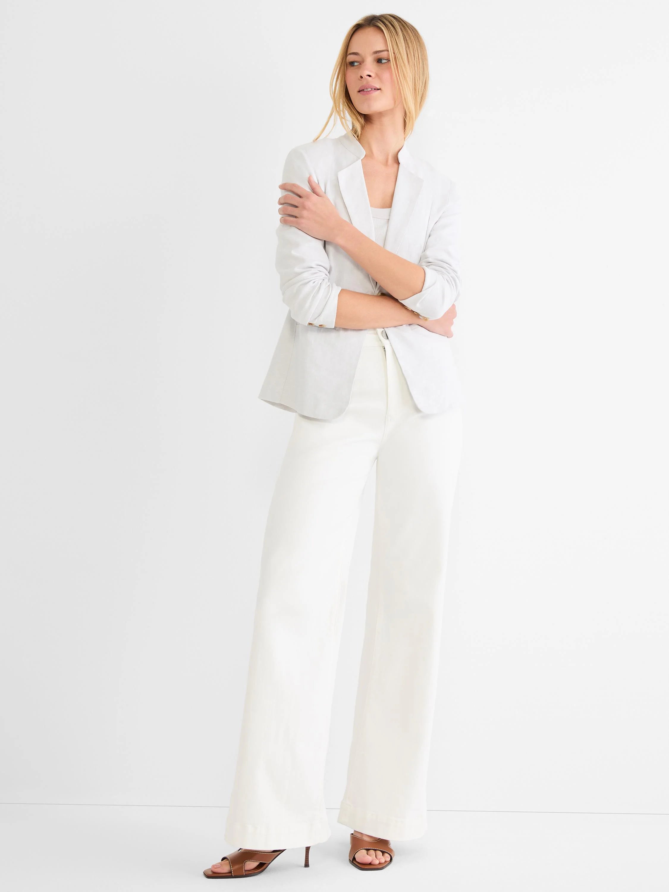 Pale grey linen blazer, stand collar, open front, long sleeves, hip-length. Features a visible weave.