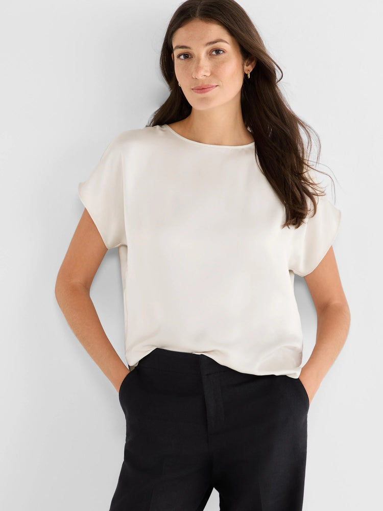 Off-white glossy woven tee with a boat neck, short cap sleeves, and a relaxed fit.