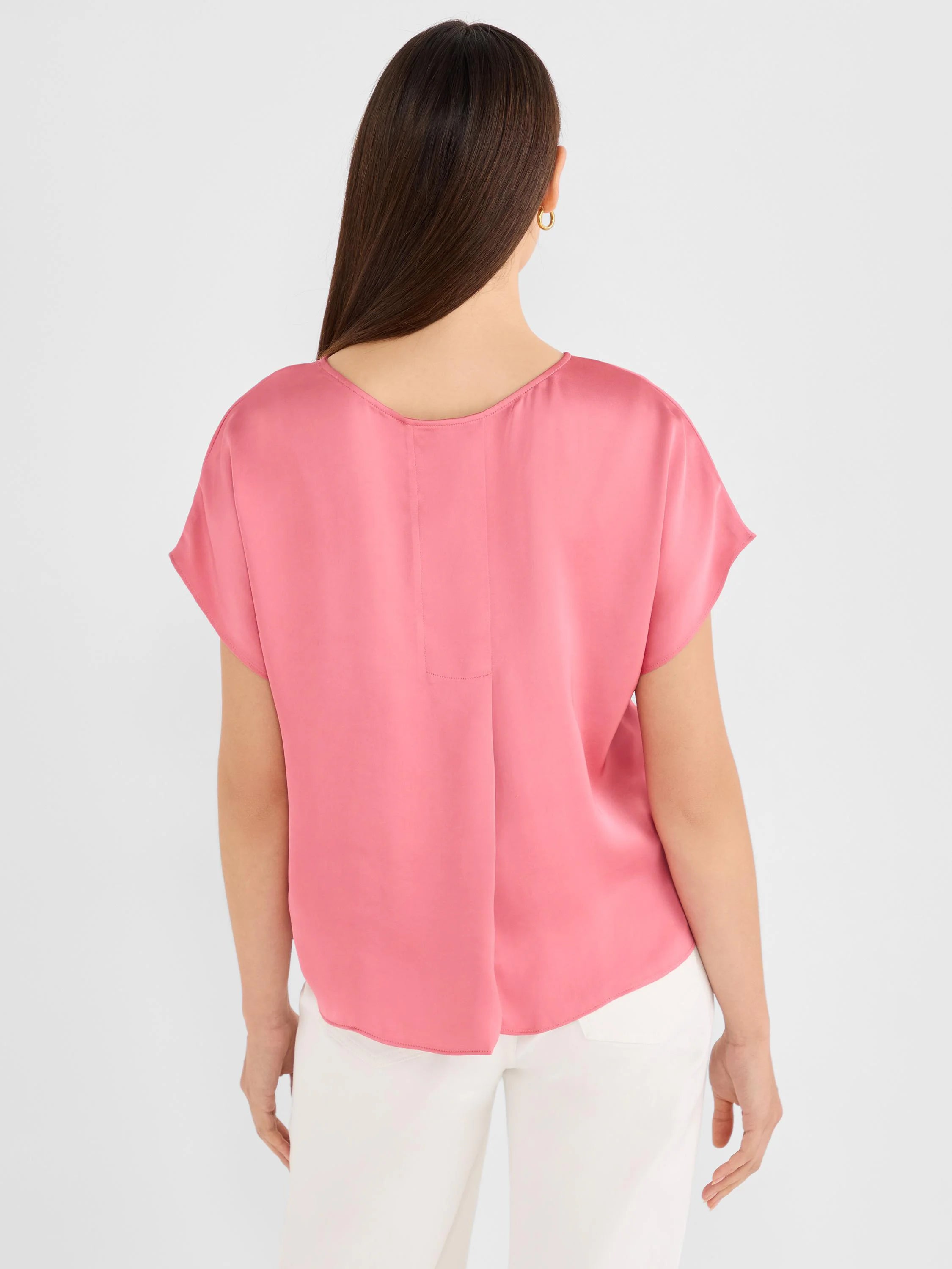 Pink glossy woven tee, shown from back. Features short, wide sleeves and a vertical seam detail down the back.