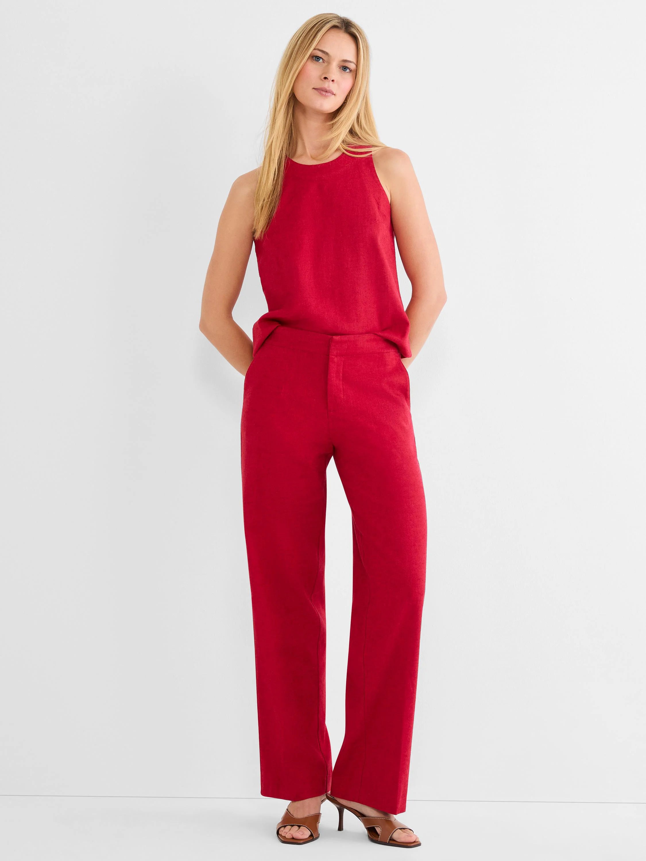 Bright red stretch linen tank, sleeveless with a round neck. Shown with matching wide-leg pants.