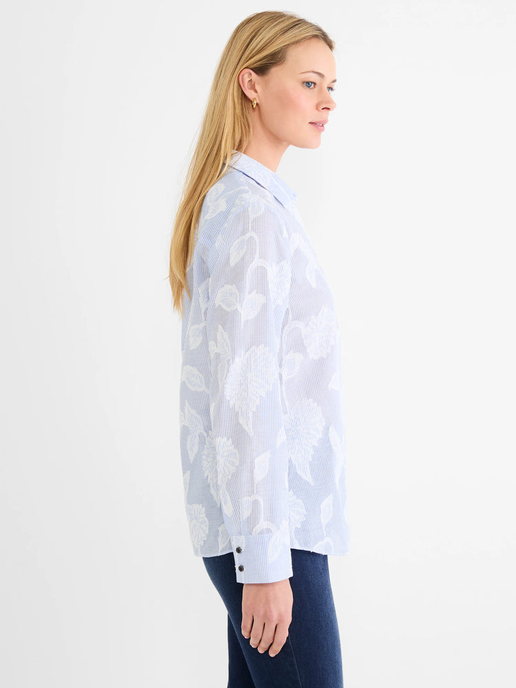Sky blue and white striped top with white jacquard floral pattern.
