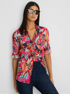 Crinkled cotton shirt, greyish-white base, vibrant abstract floral print: pink, red, orange, teal, navy.