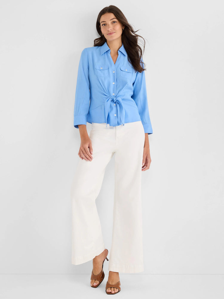 Light blue collared tie-front shirt with two chest pockets and 3/4 sleeves.