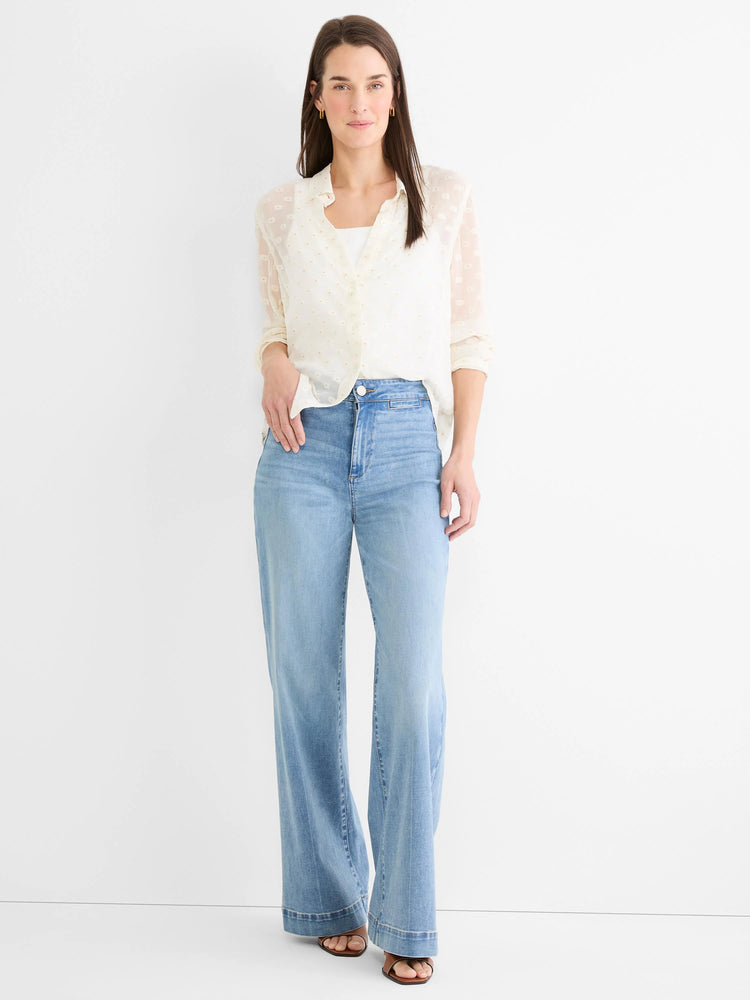 Sheer cream button-down shirt with subtle raised dots.