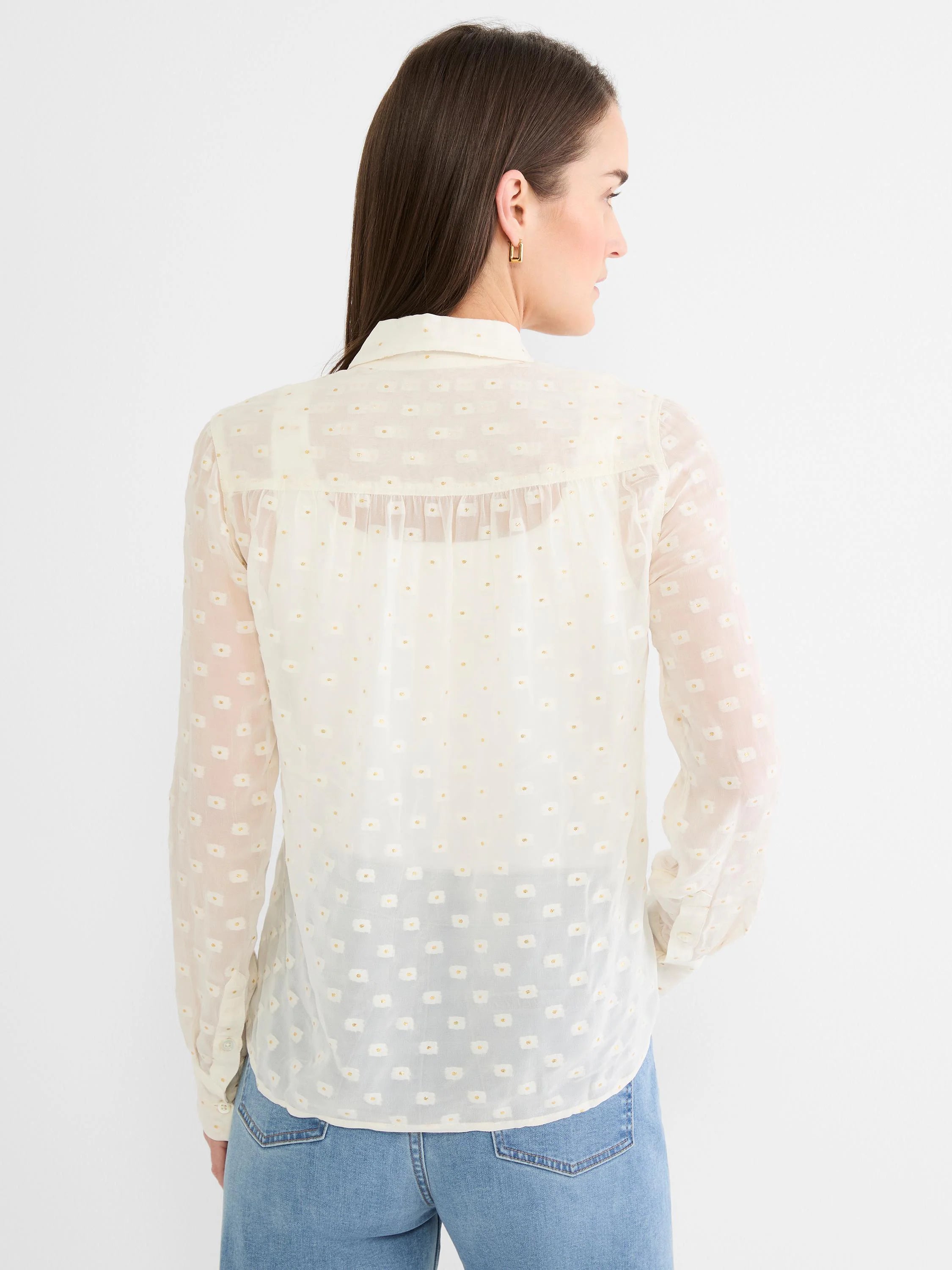 Off-white sheer collared long-sleeve shirt with woven square dots and scattered gold flecks.