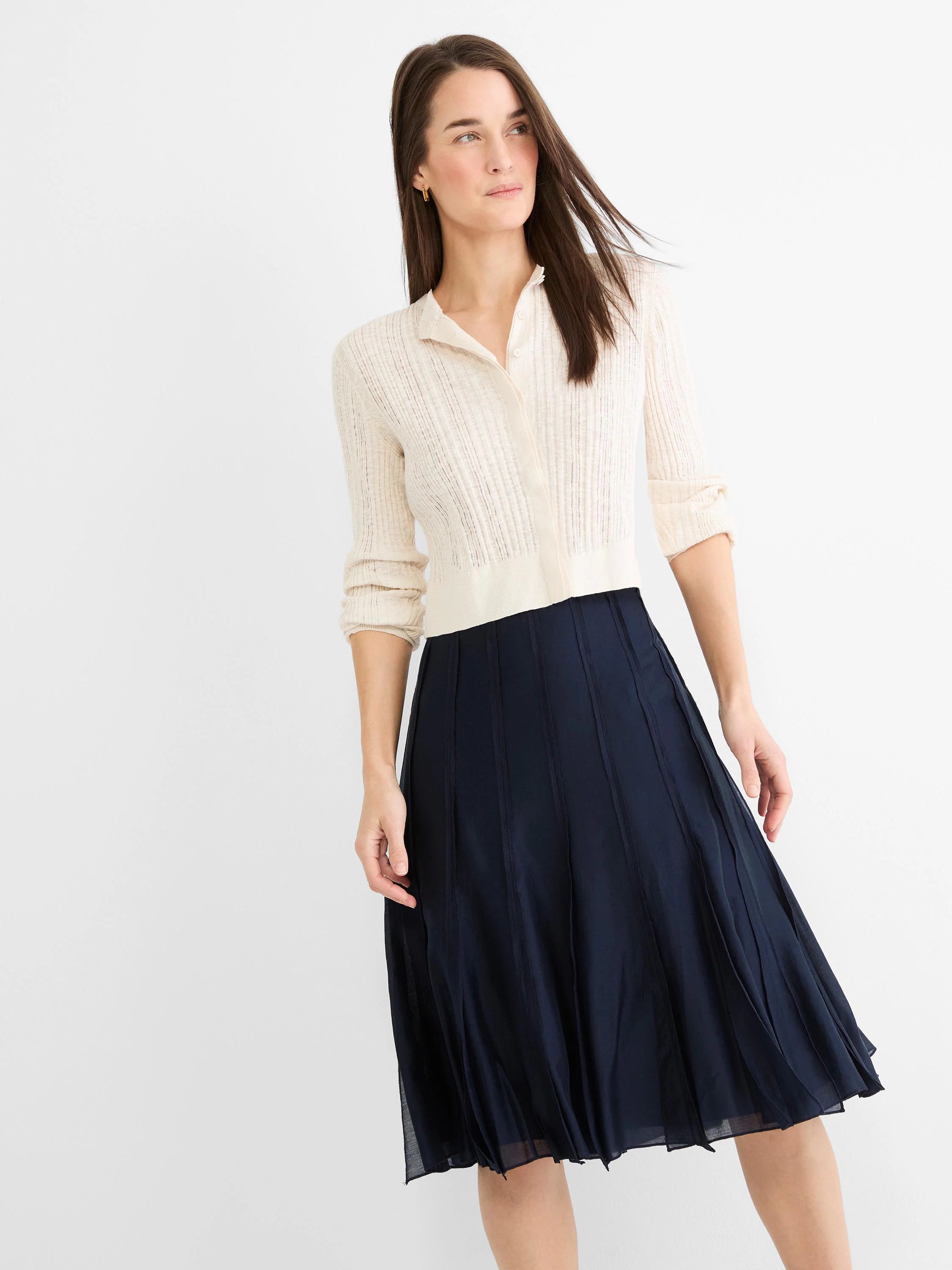 Lightweight navy blue midi skirt with distinct vertical panels.