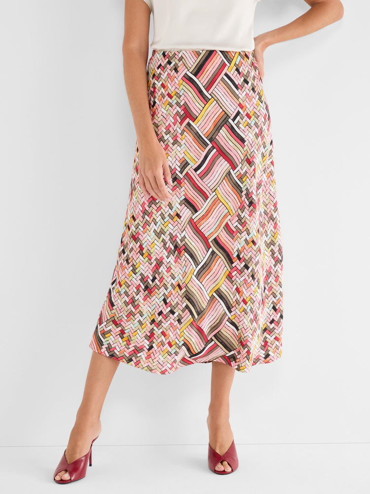 Flowy midi skirt featuring a vibrant multicolor geometric and abstract woven pattern.