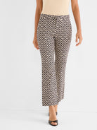 These fitted black and tan geo-print cropped pants have a straight, ankle-length silhouette.