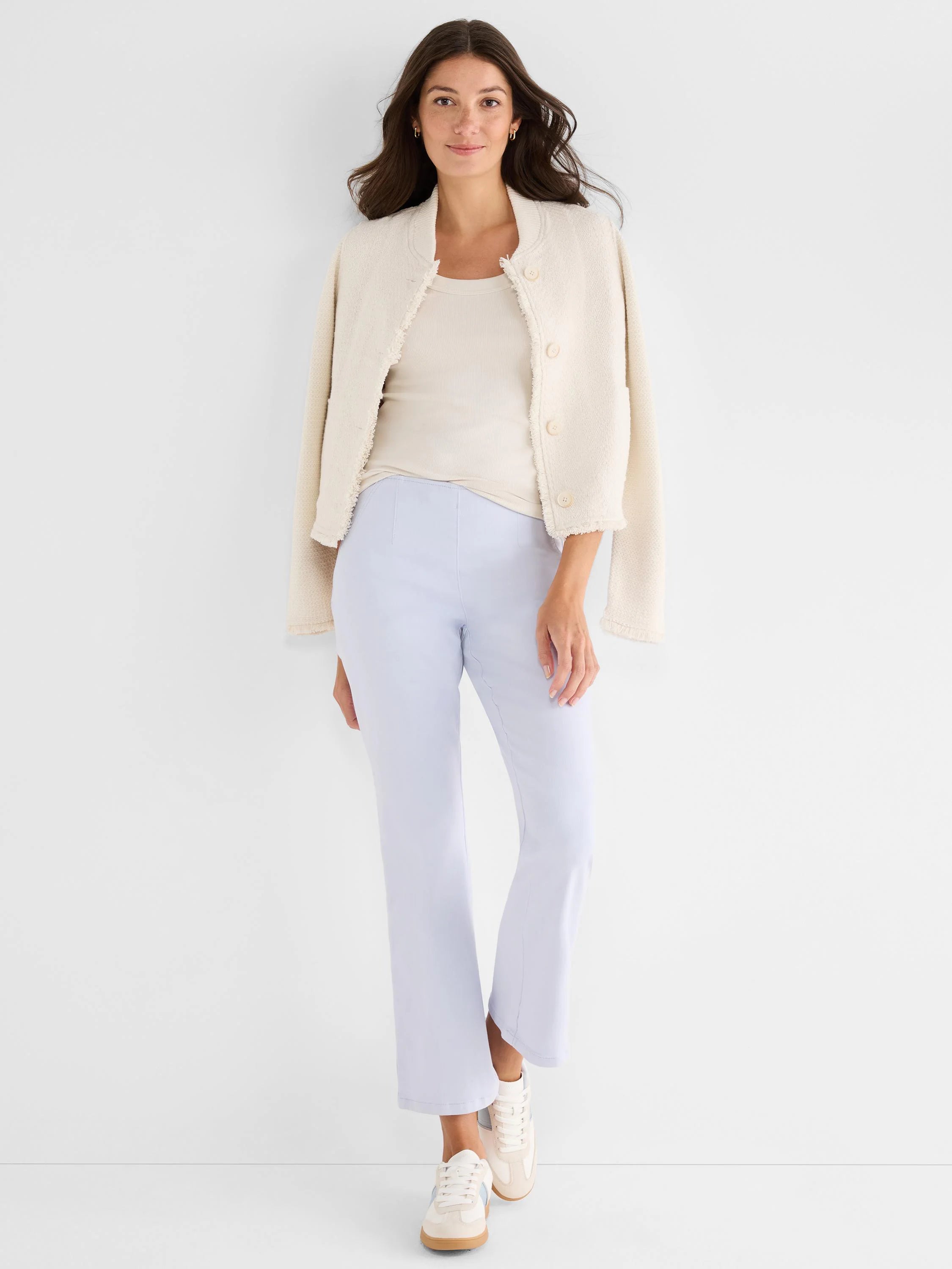 Pale blue bootcut jeans featuring distinct front seams and a subtle flare at the ankle.