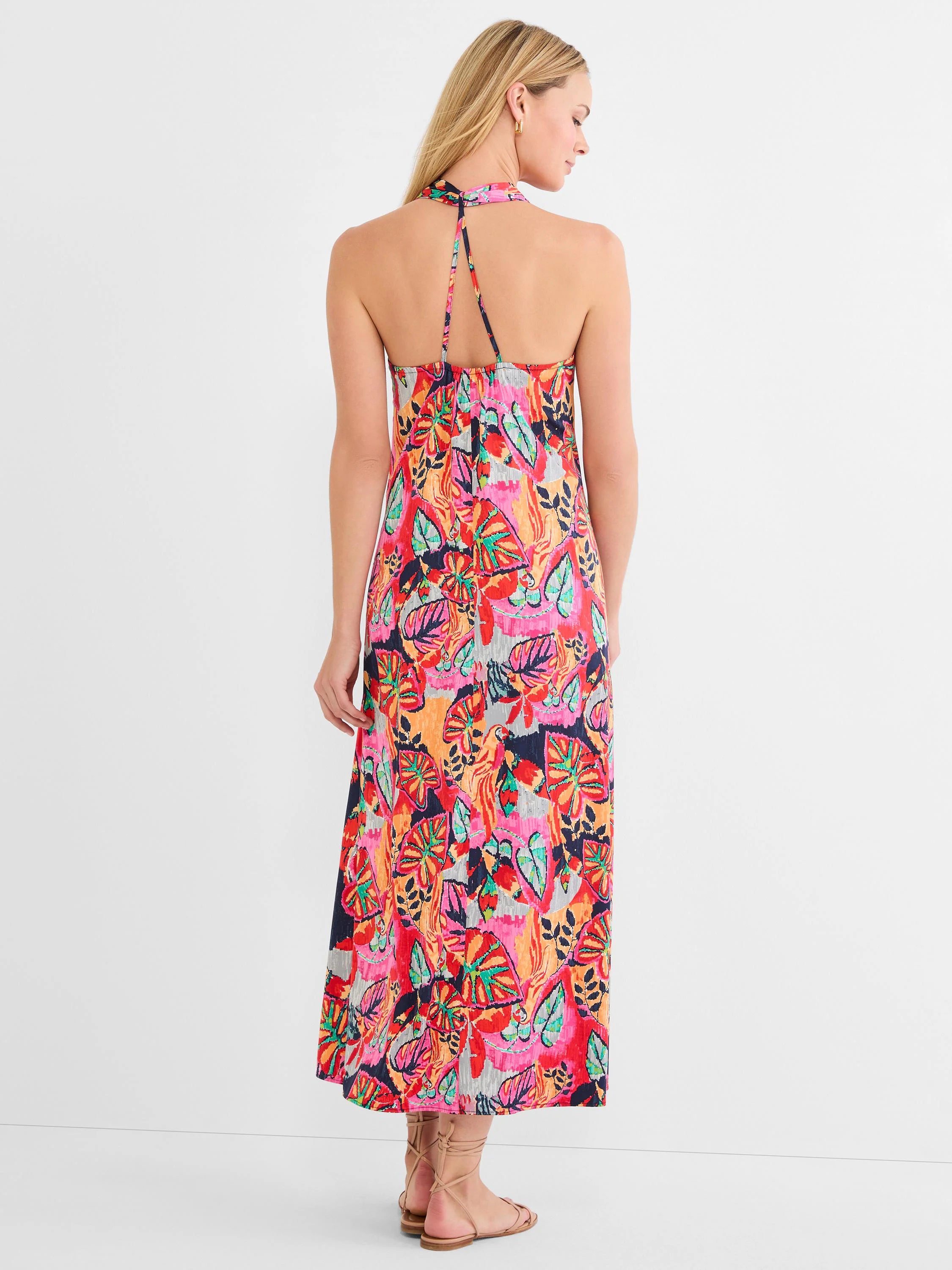 Vibrant tropical leaf print halter maxi dress: red, pink, orange, teal, navy, gray.