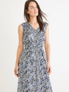Sleeveless white midi dress with abstract navy & black zig-zag print, V-neck, elastic waist.