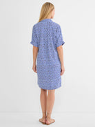 Shades of blue geometric patterned dress, shirt collar, cuffed short sleeves, above-knee length.