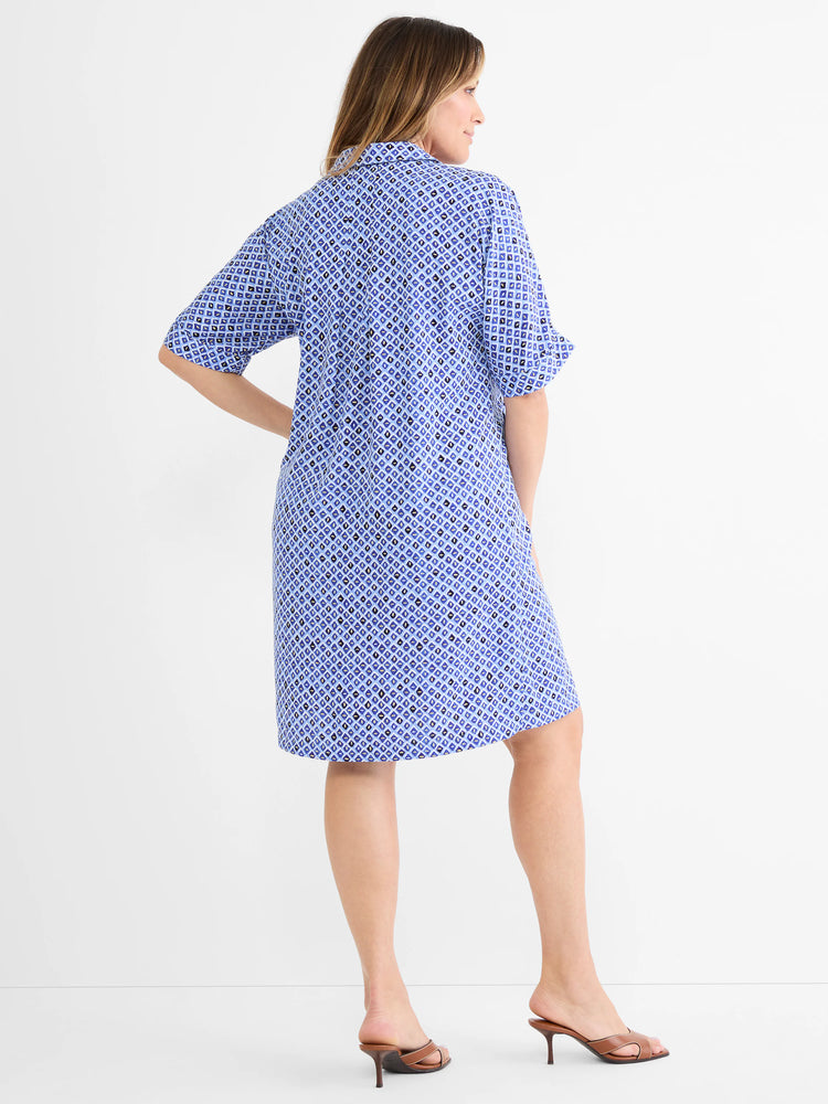 Blue mosaic print knee-length dress with a collar and short, cuffed sleeves.