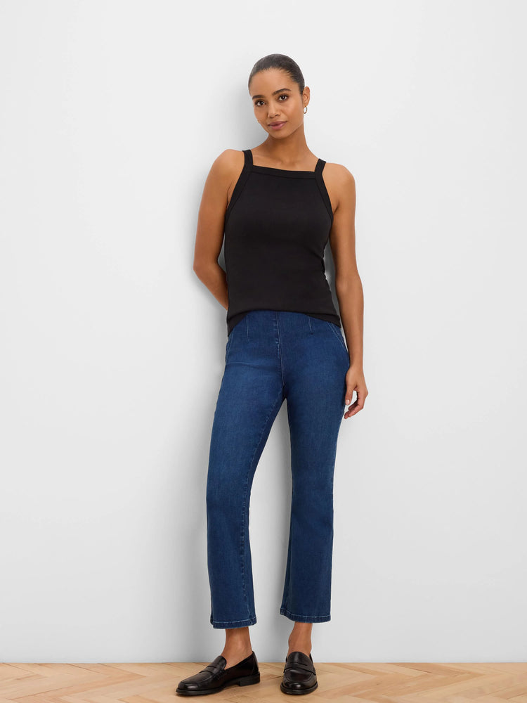 Black ribbed square neck tank top worn by a woman.