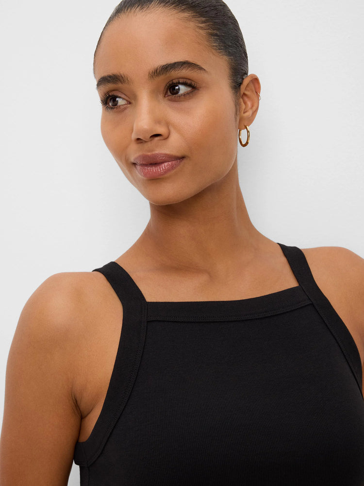 Black ribbed square neck tank with wide straps, worn by a model.