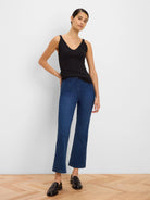 Black ribbed V-neck tank top with thin shoulder straps.