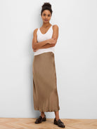 Off-white ribbed V-neck tank top.