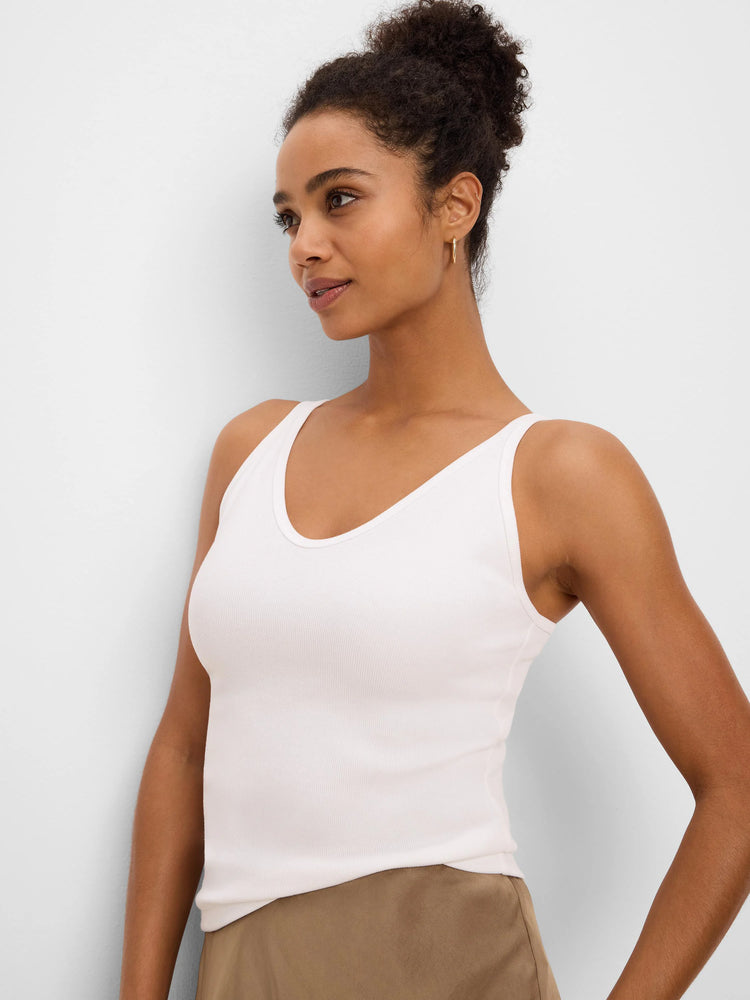 Fitted off-white ribbed V-neck tank top.