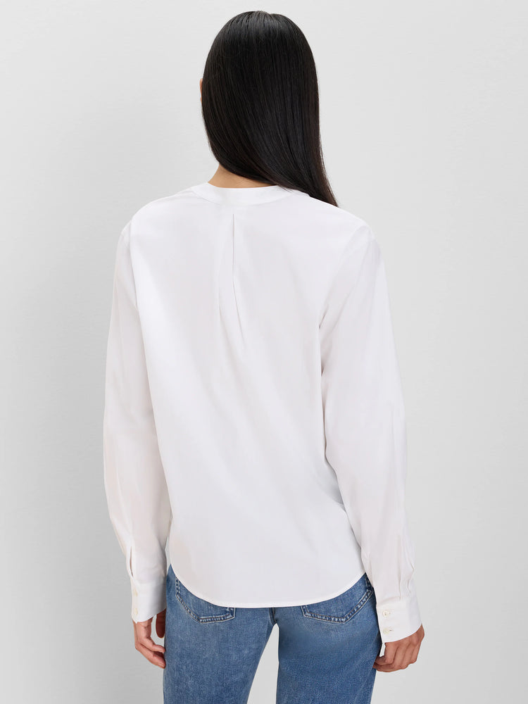 White collarless cotton shirt, back view. Features long sleeves with buttoned cuffs and a central back pleat.