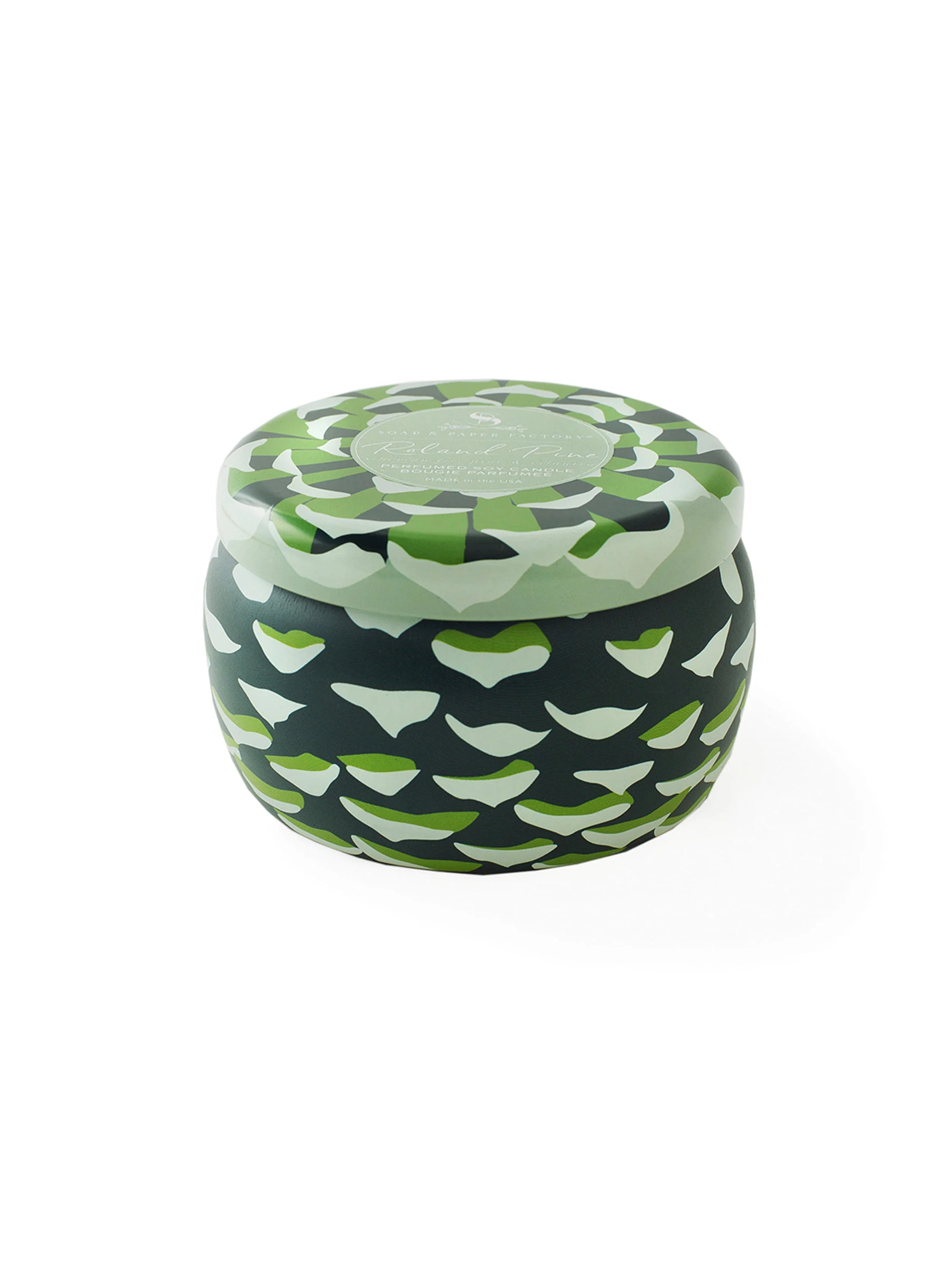Round lidded tin candle with a green and cream camouflage pattern.