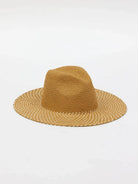 Tan woven straw continental hat with a wide brim. The crown is solid tan, and the brim has a lighter, open dotted weave...